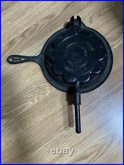 ALFRED ANDRESEN & CO MINNEAPOLIS. CAST IRON HEART SHAPED WAFFLE IRON. With Base