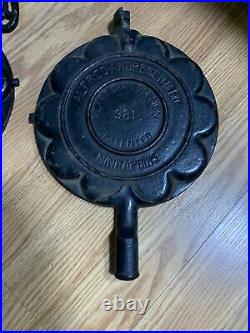 ALFRED ANDRESEN & CO MINNEAPOLIS. CAST IRON HEART SHAPED WAFFLE IRON. With Base