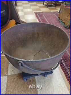 Antique Cast Iron Large 3 Footed Cooking Pot 2 ft x 1 ft has a bottom crack