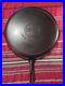 Vintage_Griswold_14_Cast_Iron_Large_Logo_718_Skillet_With_Heat_Ring_Sits_Flat_01_covt